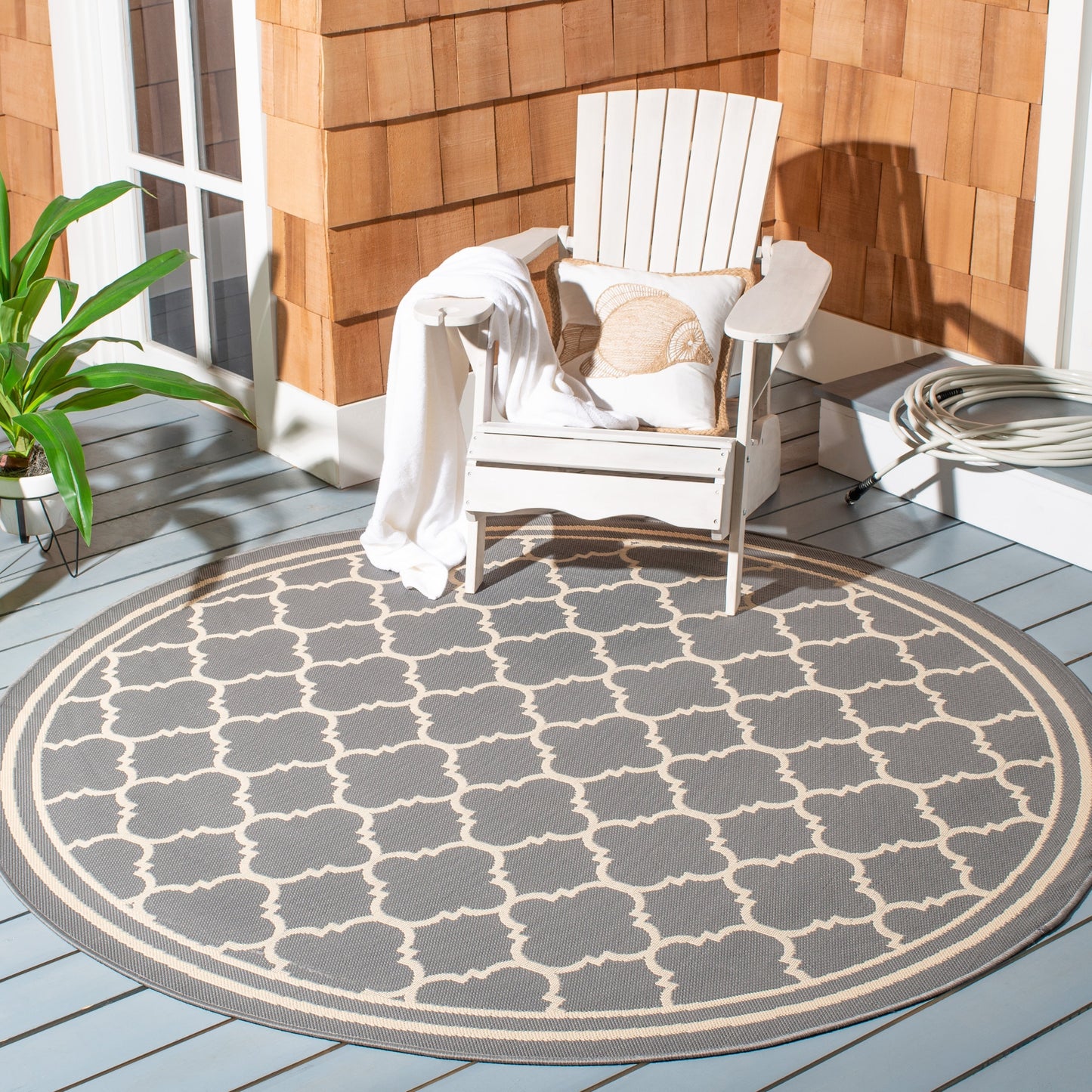 Tapis de jardin imperméable d'intérieur/extérieur SAFAVIEH Courtyard Kristelle