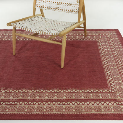 Tapis d'intérieur/extérieur à bordure transitionnelle Carew