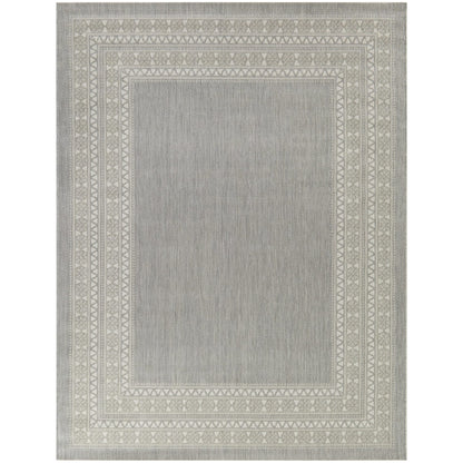 Tapis d'intérieur/extérieur à bordure transitionnelle Carew