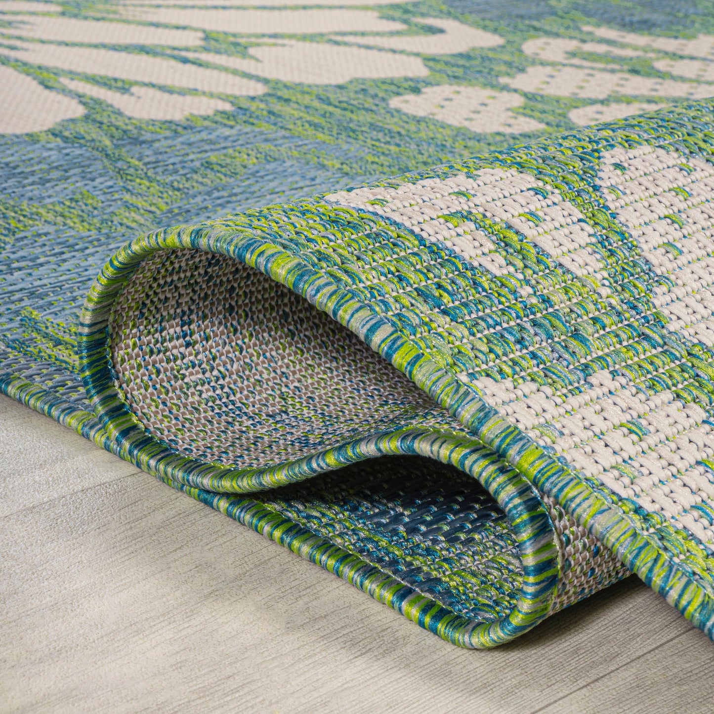 Tapis d'intérieur/extérieur à tissage texturé floral JONATHAN Y