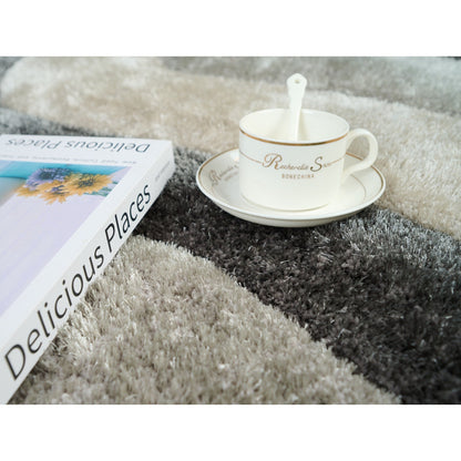 Tapis à poils longs Mateos au design abstrait