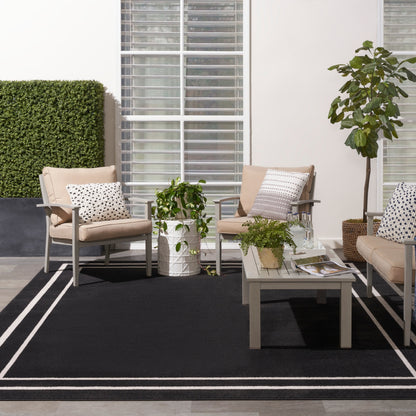 Tapis uni d'intérieur/extérieur Nourison Essentials