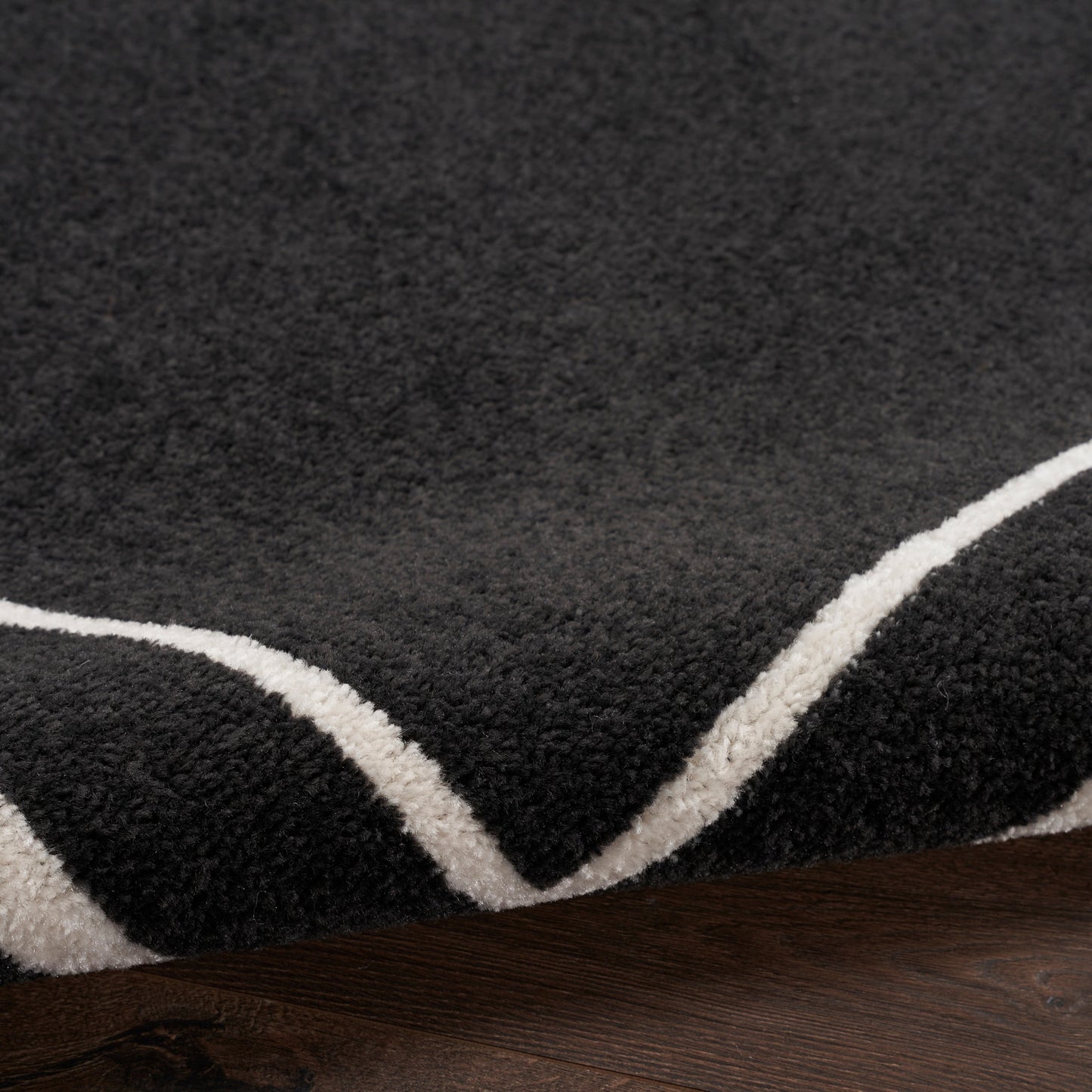 Tapis uni d'intérieur/extérieur Nourison Essentials