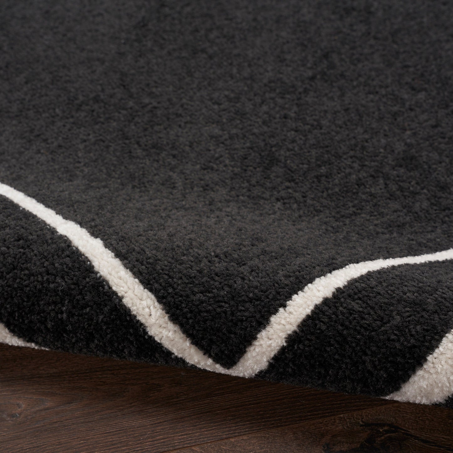 Tapis d'intérieur/extérieur uni Nourison Sandy