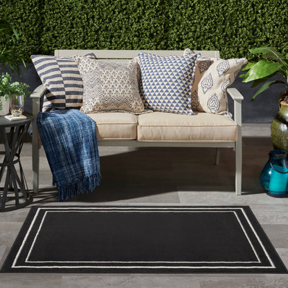 Tapis d'intérieur/extérieur uni Nourison Sandy
