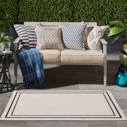Tapis d'intérieur/extérieur uni Nourison Sandy