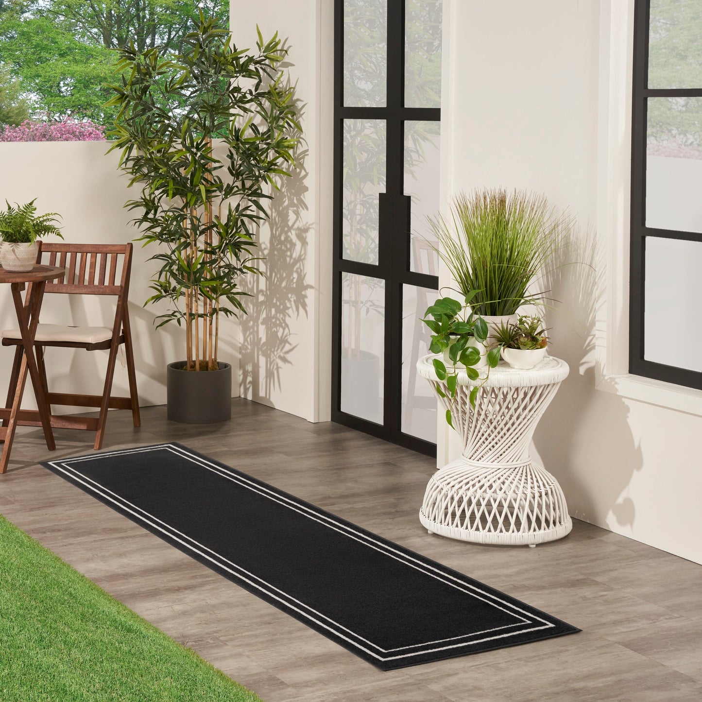 Tapis d'intérieur/extérieur uni Nourison Sandy