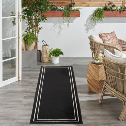 Tapis d'intérieur/extérieur uni Nourison Sandy