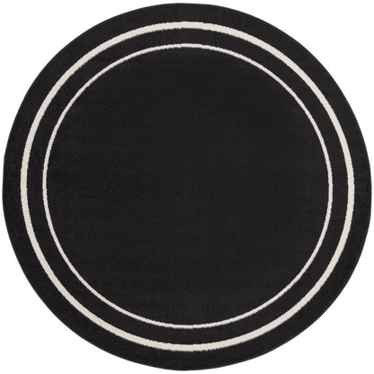 Tapis d'intérieur/extérieur uni Nourison Sandy