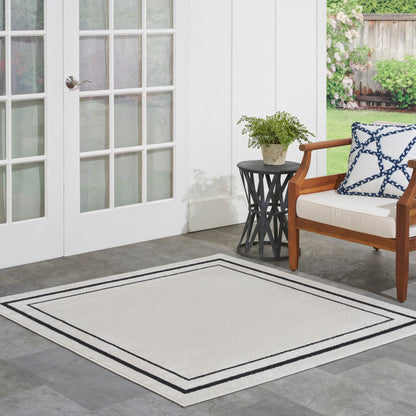 Tapis d'intérieur/extérieur uni Nourison Sandy