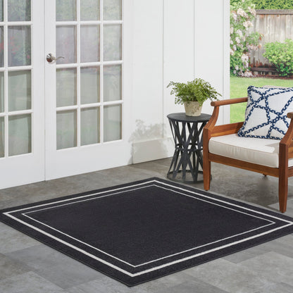 Tapis d'intérieur/extérieur uni Nourison Sandy