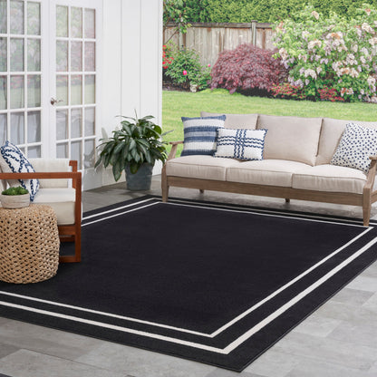 Tapis d'intérieur/extérieur uni Nourison Sandy