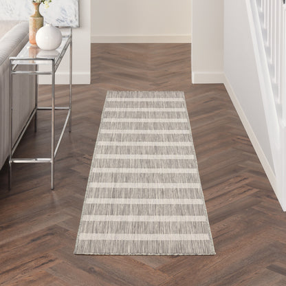 Tapis rayé intérieur/extérieur Nourison Selerno.