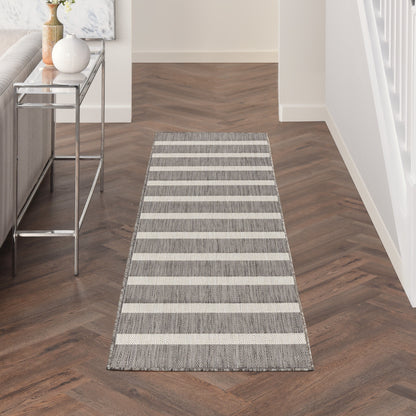 Tapis rayé intérieur/extérieur Nourison Selerno.