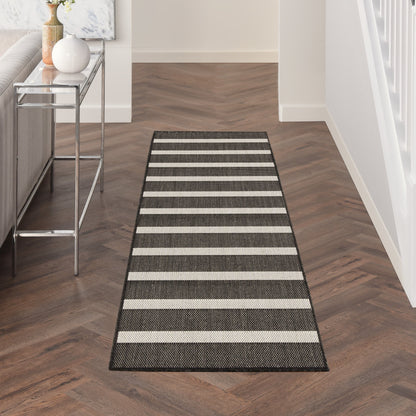 Tapis rayé intérieur/extérieur Nourison Selerno.
