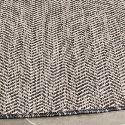 Tapis de jardin imperméable pour intérieur/extérieur SAFAVIEH Courtyard Ilmur