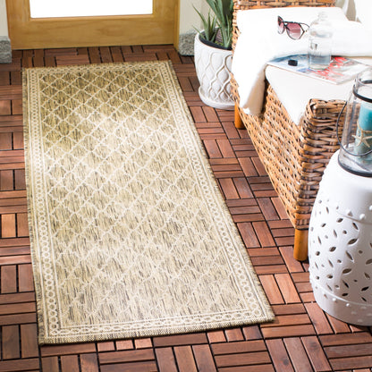 Tapis de jardin imperméable pour intérieur/extérieur SAFAVIEH Courtyard Janell Treillis
