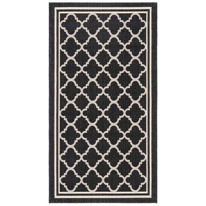 Tapis de jardin imperméable d'intérieur/extérieur SAFAVIEH Courtyard Kristelle