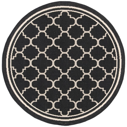 Tapis de jardin imperméable d'intérieur/extérieur SAFAVIEH Courtyard Kristelle