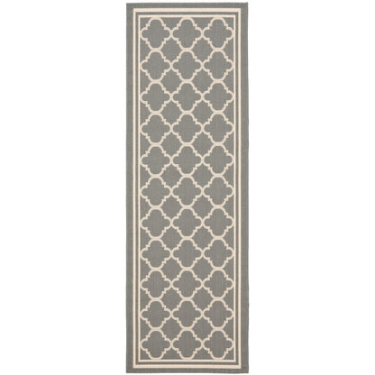 Tapis de jardin imperméable d'intérieur/extérieur SAFAVIEH Courtyard Kristelle