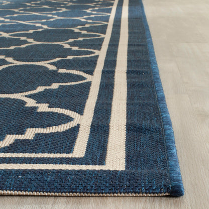 Tapis de jardin imperméable d'intérieur/extérieur SAFAVIEH Courtyard Kristelle