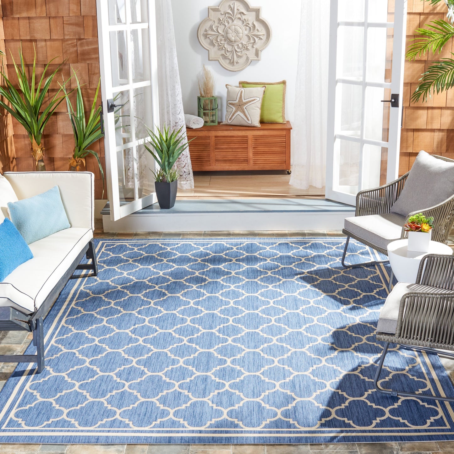 Tapis de jardin imperméable d'intérieur/extérieur SAFAVIEH Courtyard Kristelle