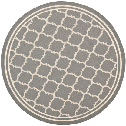 Tapis de jardin imperméable d'intérieur/extérieur SAFAVIEH Courtyard Kristelle
