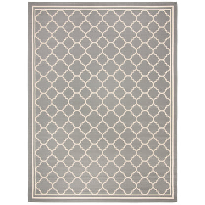 Tapis de jardin imperméable d'intérieur/extérieur SAFAVIEH Courtyard Kristelle