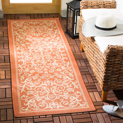 Tapis de jardin imperméable d'intérieur/extérieur SAFAVIEH Courtyard Miljeta