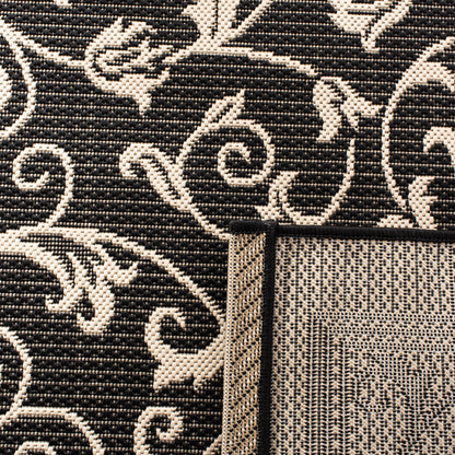 Tapis de jardin imperméable d'intérieur/extérieur SAFAVIEH Courtyard Miljeta