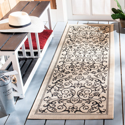 Tapis de jardin imperméable d'intérieur/extérieur SAFAVIEH Courtyard Miljeta