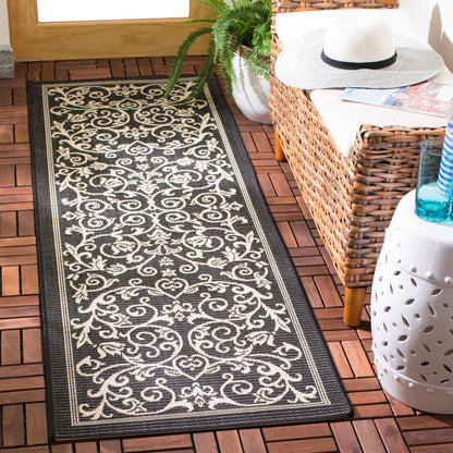 Tapis de jardin imperméable d'intérieur/extérieur SAFAVIEH Courtyard Miljeta