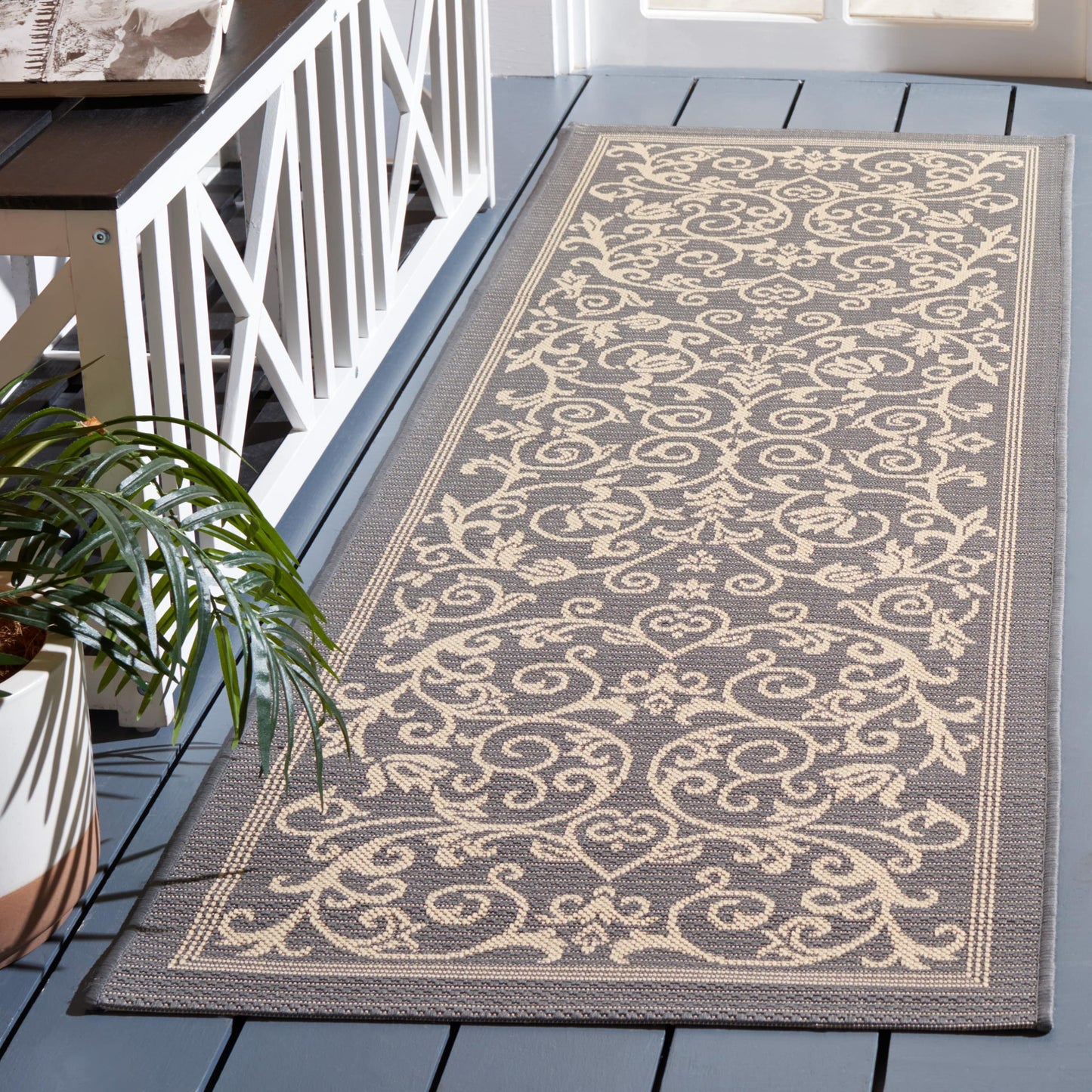 Tapis de jardin imperméable d'intérieur/extérieur SAFAVIEH Courtyard Miljeta