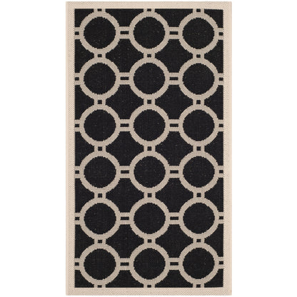 Tapis de jardin imperméable d'intérieur/extérieur SAFAVIEH Courtyard Nira