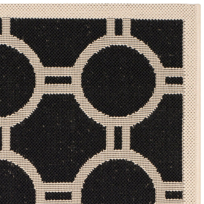 Tapis de jardin imperméable d'intérieur/extérieur SAFAVIEH Courtyard Nira