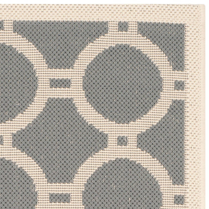 Tapis de jardin imperméable d'intérieur/extérieur SAFAVIEH Courtyard Nira