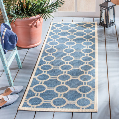 Tapis de jardin imperméable d'intérieur/extérieur SAFAVIEH Courtyard Nira
