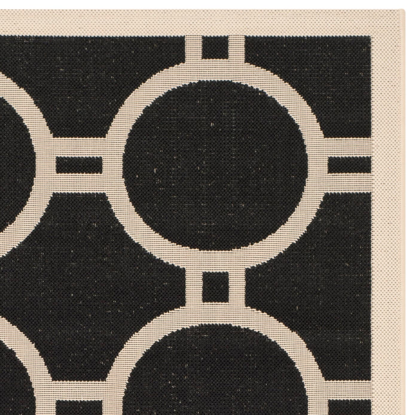 Tapis de jardin imperméable d'intérieur/extérieur SAFAVIEH Courtyard Nira