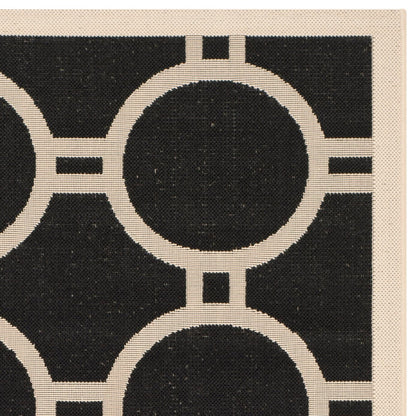 Tapis de jardin imperméable d'intérieur/extérieur SAFAVIEH Courtyard Nira