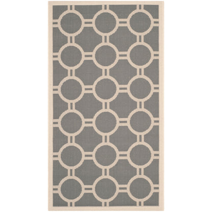 Tapis de jardin imperméable d'intérieur/extérieur SAFAVIEH Courtyard Nira