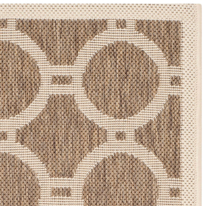 Tapis de jardin imperméable d'intérieur/extérieur SAFAVIEH Courtyard Nira