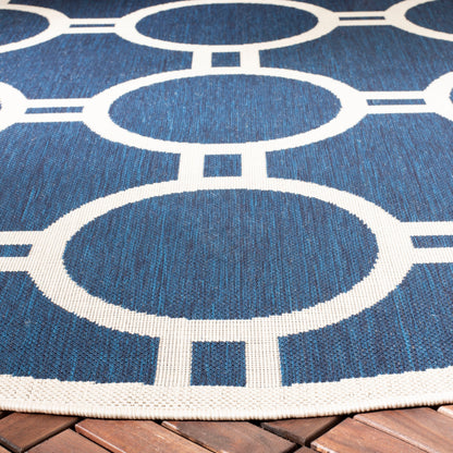 Tapis de jardin imperméable d'intérieur/extérieur SAFAVIEH Courtyard Nira