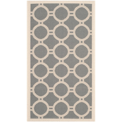 Tapis de jardin imperméable d'intérieur/extérieur SAFAVIEH Courtyard Nira
