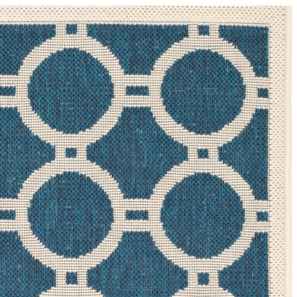 Tapis de jardin imperméable d'intérieur/extérieur SAFAVIEH Courtyard Nira