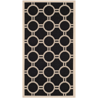 Tapis de jardin imperméable d'intérieur/extérieur SAFAVIEH Courtyard Nira