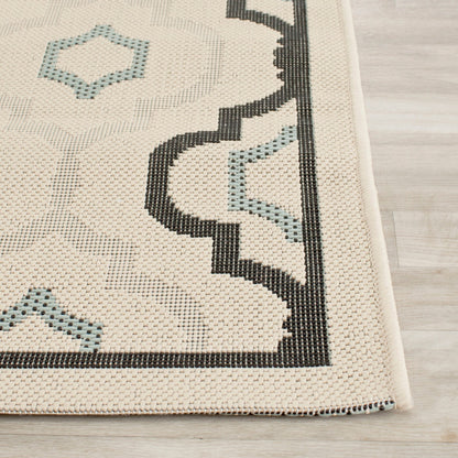 Tapis de jardin imperméable pour intérieur/extérieur SAFAVIEH Courtyard Oyvor