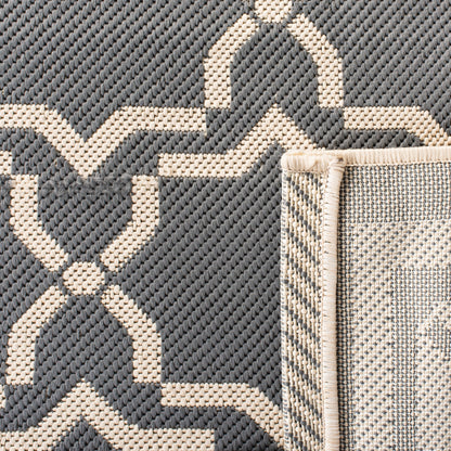 Tapis de jardin imperméable d'intérieur/extérieur SAFAVIEH Courtyard Thomasina