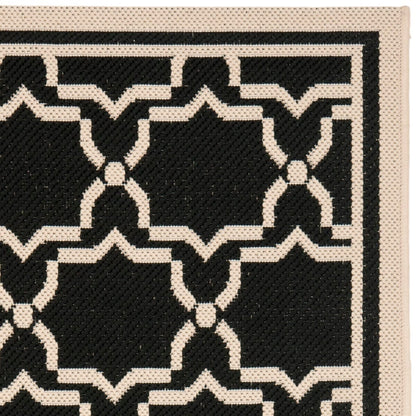 Tapis de jardin imperméable d'intérieur/extérieur SAFAVIEH Courtyard Thomasina