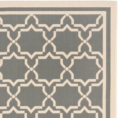 Tapis de jardin imperméable d'intérieur/extérieur SAFAVIEH Courtyard Thomasina