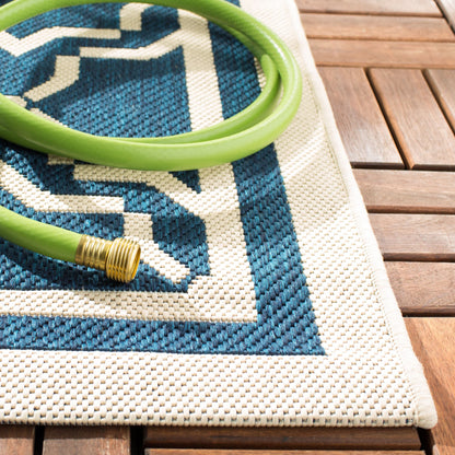 Tapis de jardin imperméable d'intérieur/extérieur SAFAVIEH Courtyard Thomasina